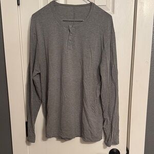 Men’s size Large light weight Lululemon 3 button Henley in light gray.